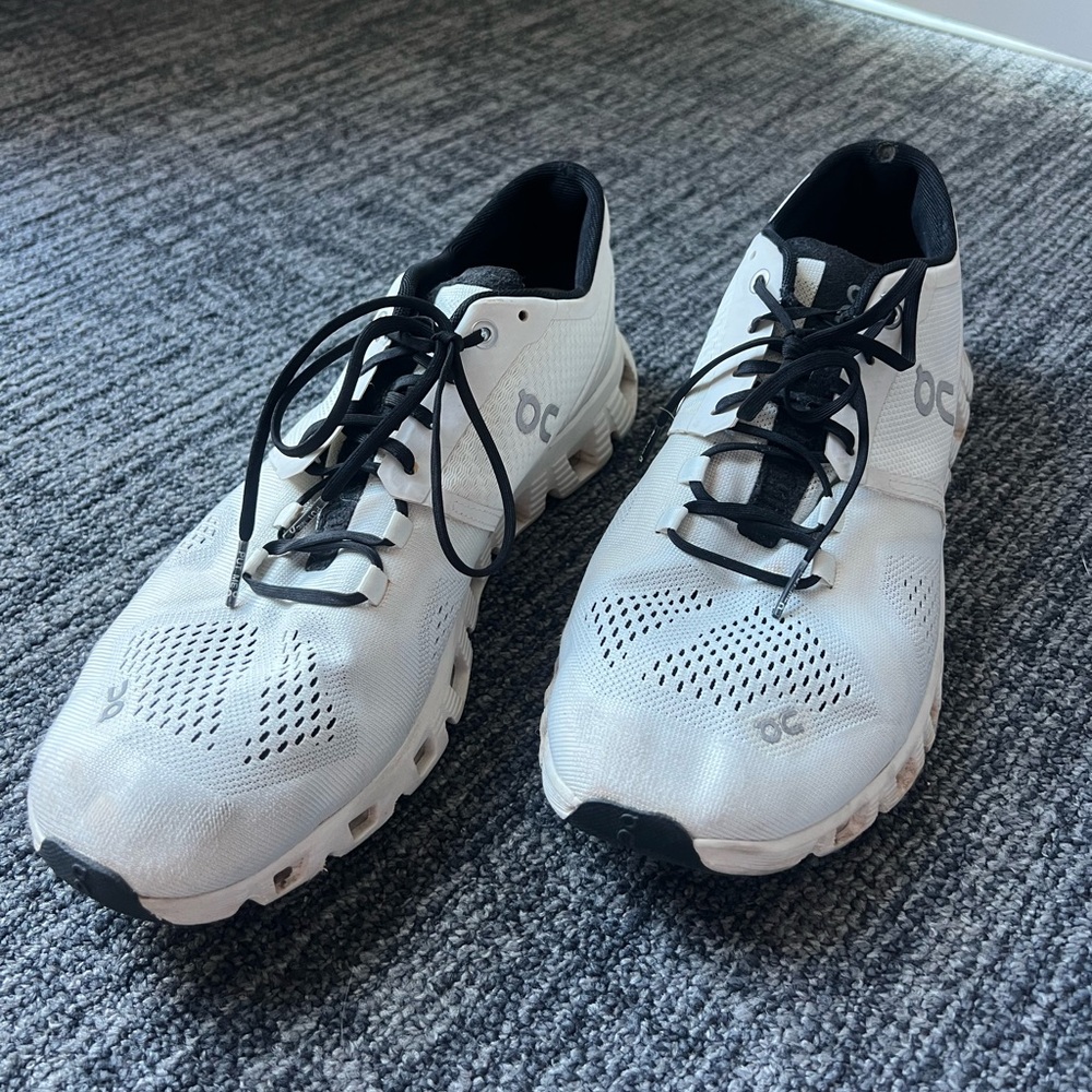 On Running White and Black Athletic Running Shoes